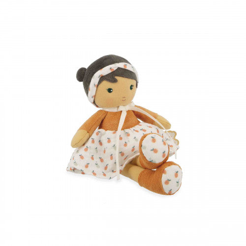 Seated side view of Kaloo Éloise 25 cm doll showing orange corduroy and fruit details