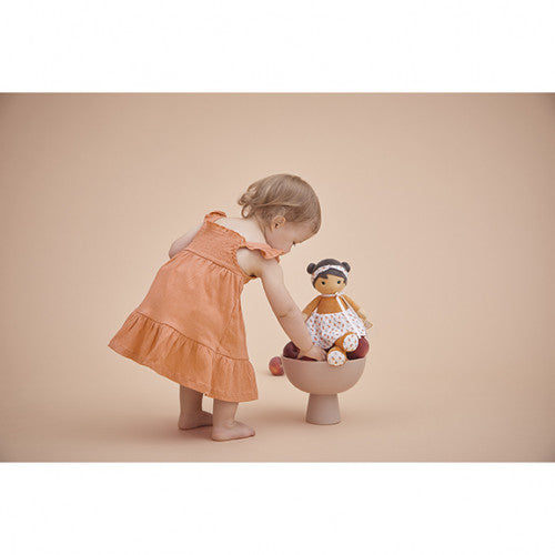 Child playing with Kaloo Eloise doll in ceramic bowl for play use case