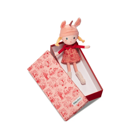 Lena fabric doll in pink corduroy hat with bunny ears and striped horn inside gift box