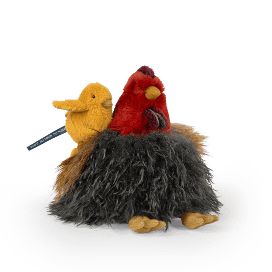 Close up of Moulin Roty yellow plush chick texture and beak
