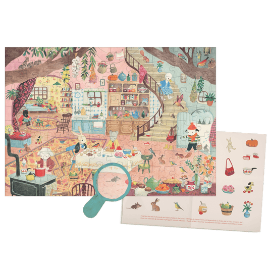 Assembled 100-piece Moulin Roty puzzle with magnifying glass revealing hidden animals