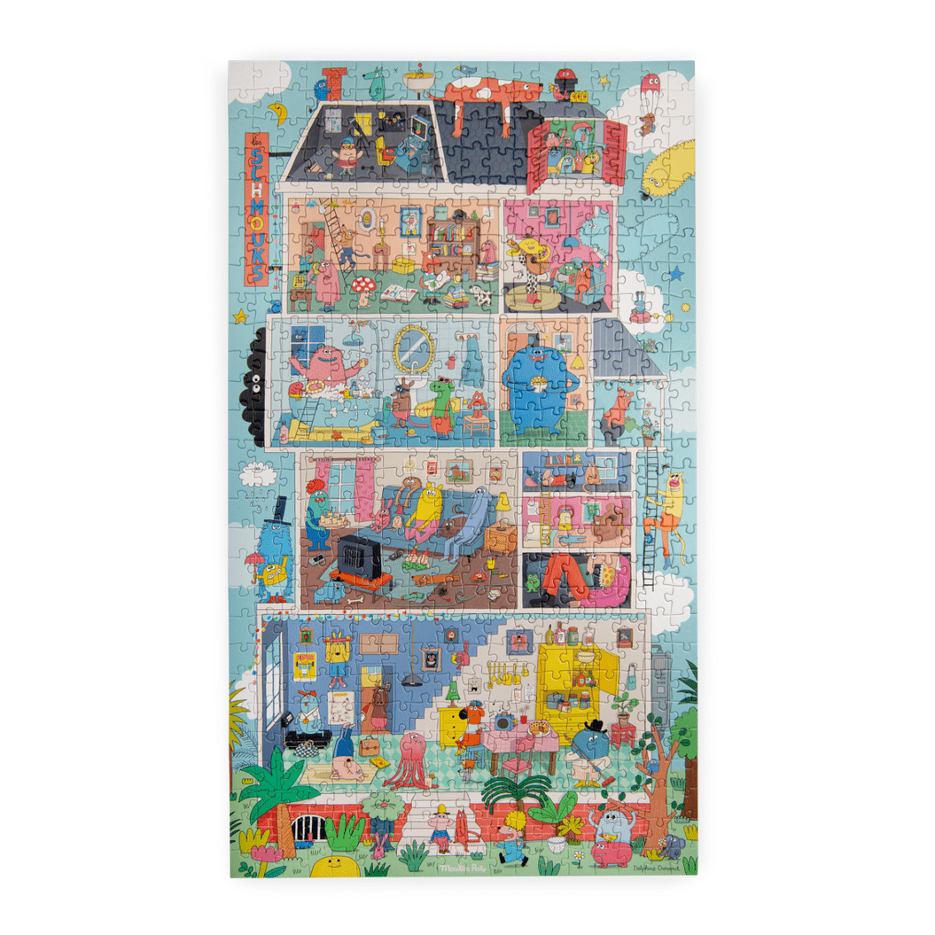 Completed 500-piece Les Schmouks jigsaw puzzle displaying a whimsical multi-story house cutaway