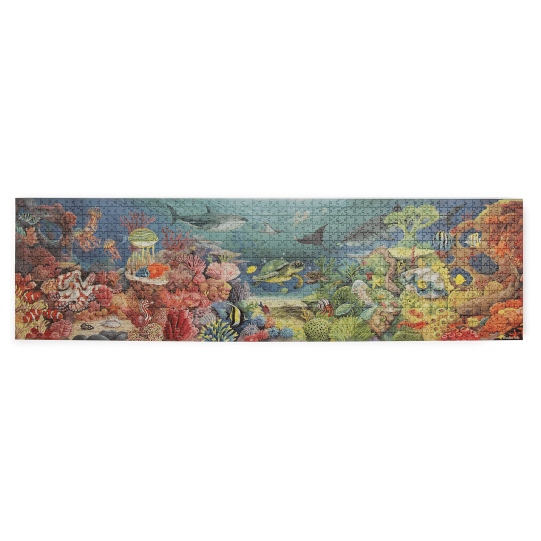 Assembled 1000-piece Moulin Roty Coral Reef puzzle featuring sea turtle, clownfish, and vibrant marine ecosystem