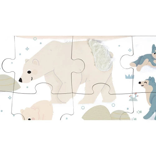 Close-up of tactile polar bear cub puzzle piece with textured fur detail