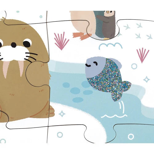 Tactile polar animals puzzle close-up showing glitter fish and textured walrus