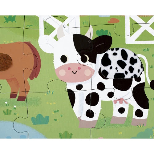 Black and white calf tactile puzzle piece with raised texture