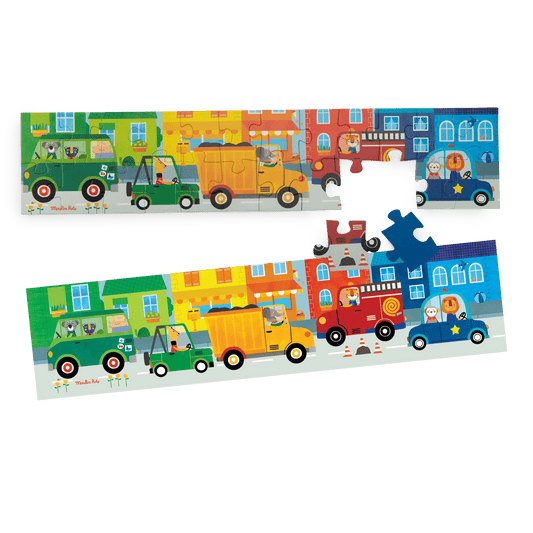 Assembled Moulin Roty animal vehicle puzzle with matching poster