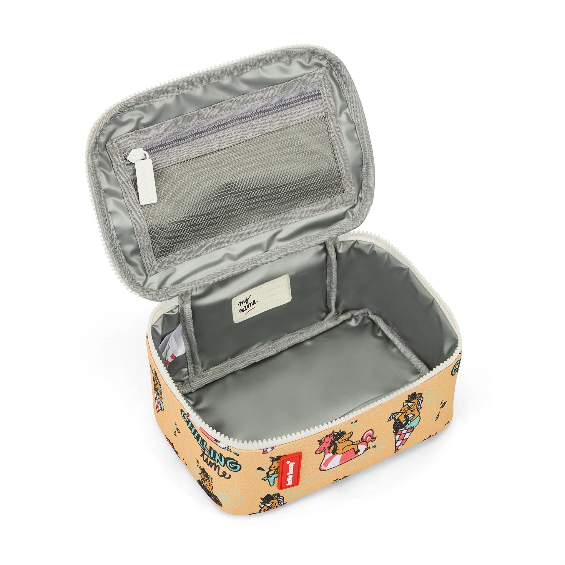 Open interior view of unicorn lunch bag showing gray lining and mesh pocket