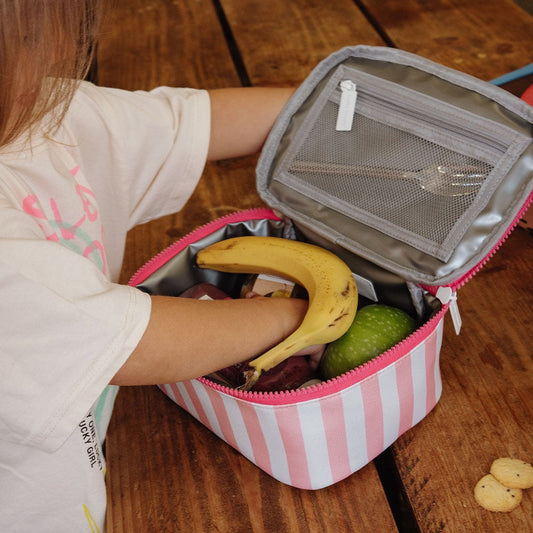 Open pink striped insulated lunch bag showing silver lining and mesh pocket