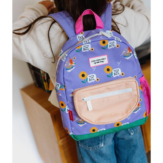 Child wearing purple Hello Hossy backpack with peach front pocket and Italian text graphics