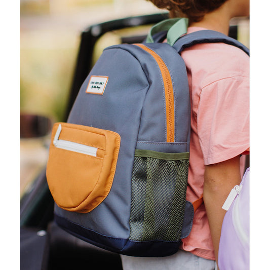 Close-up of gray-blue children's backpack with orange trim and side mesh pocket