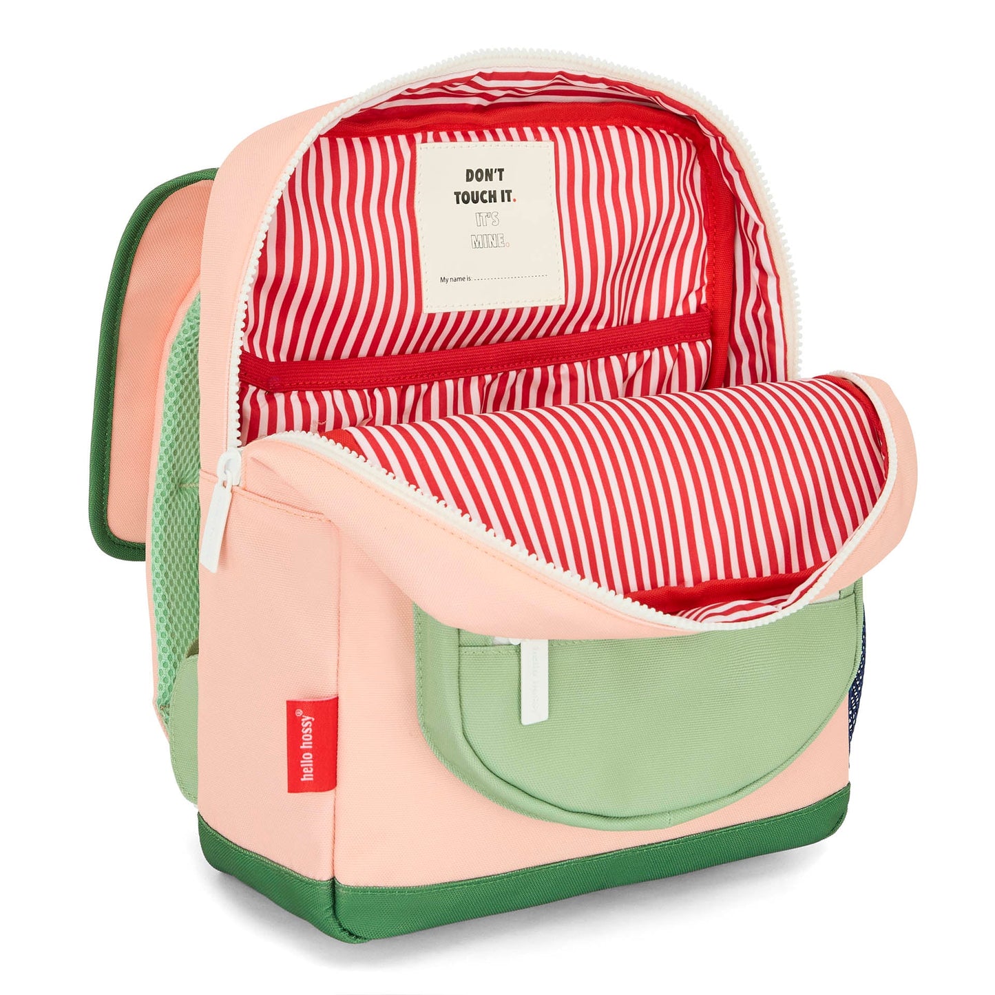 Interior of pink kids backpack with striped lining and name tag