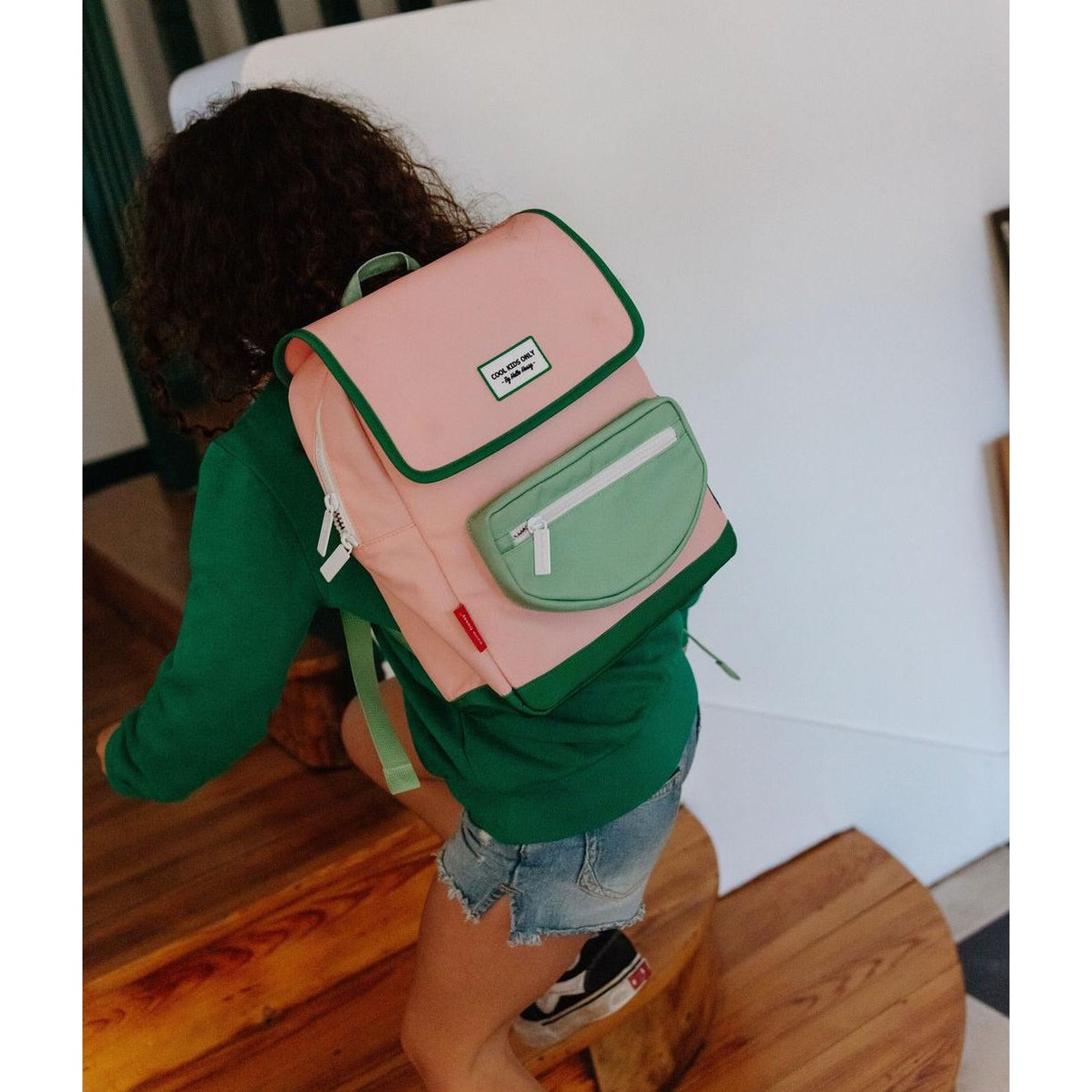 Pink and green square kids backpack with adjustable straps
