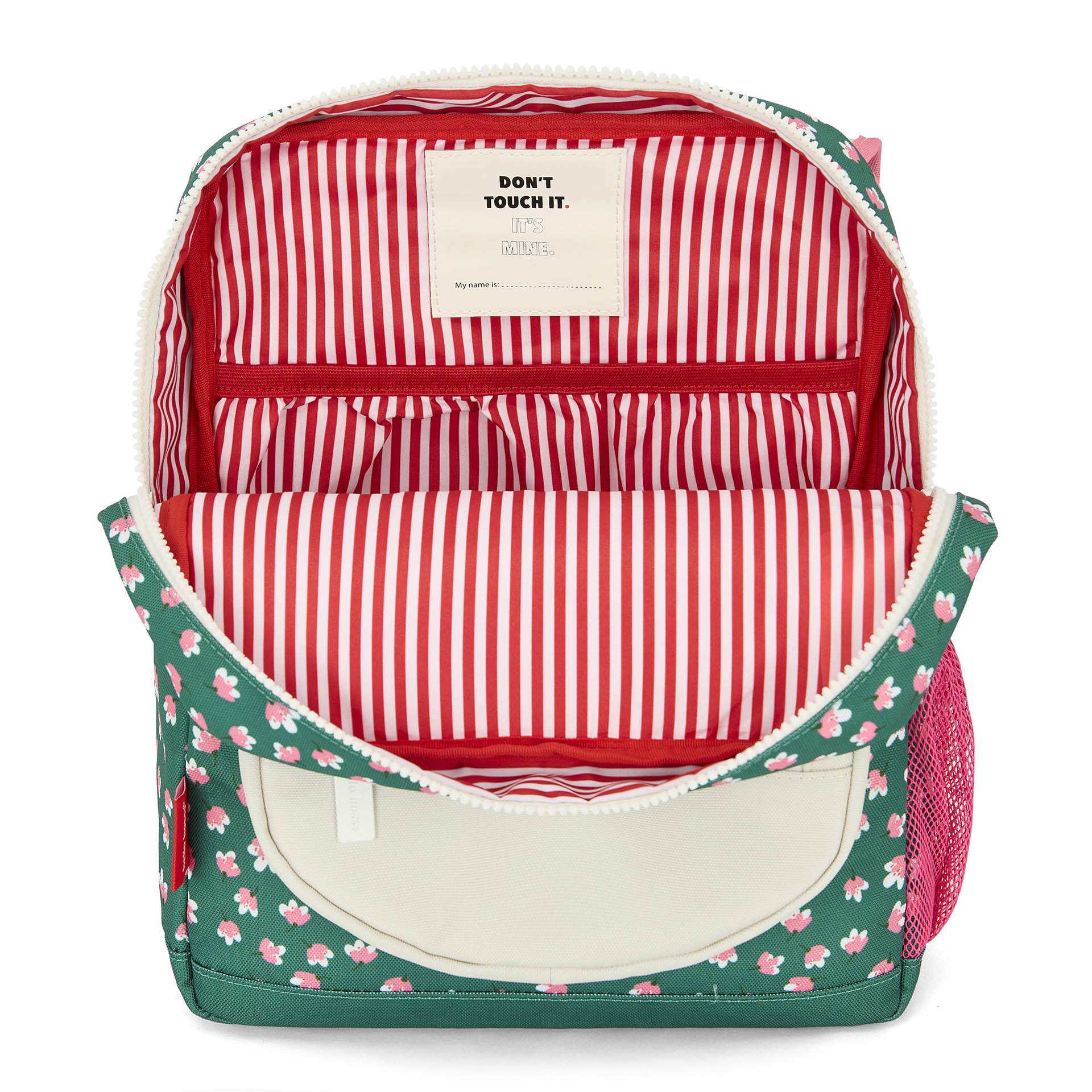 Interior of green floral kids backpack with striped lining and name tag pocket