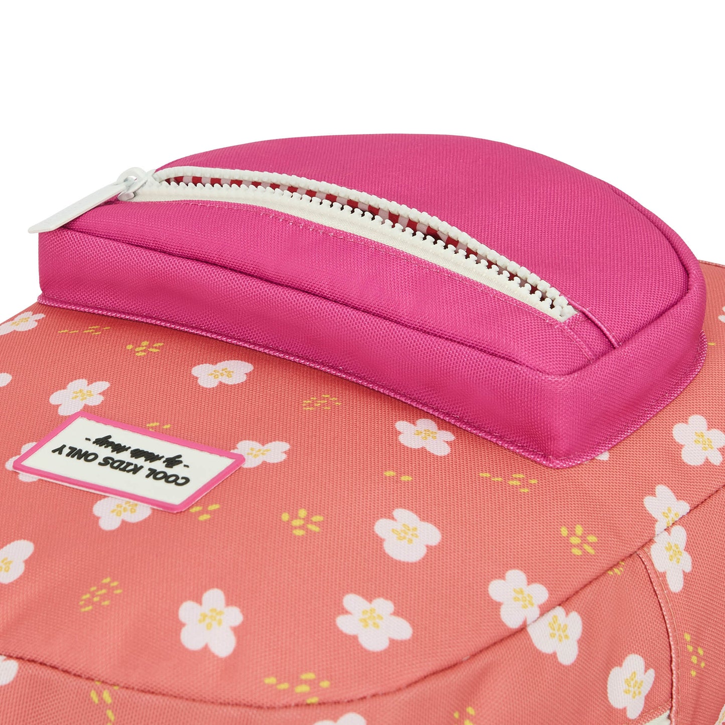 Close-up of Hello Hossy kids backpack top with 'Cool Kids Only' label and zipper detail