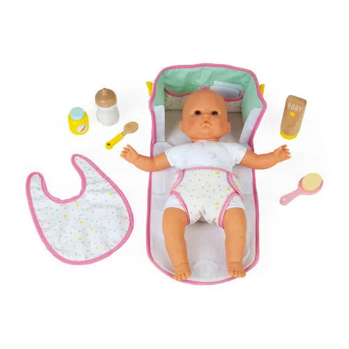 Doll play set with accessories on Janod nursery changing mat