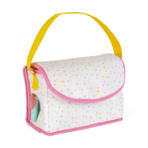 Closed white polka dot fabric toy bag with yellow handle and snap closure