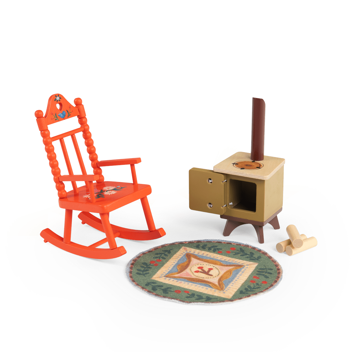 Moulin Roty cozy fireplace play set with orange rocking chair, rug, and stove