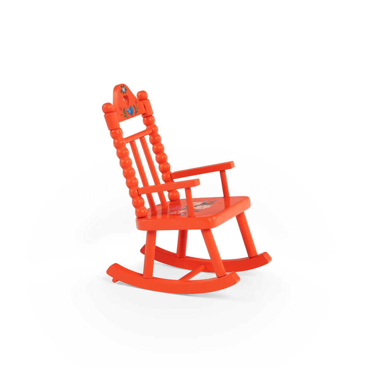Side view of bright orange wooden rocking chair with hand-painted floral details