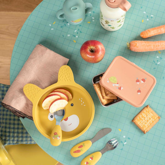 Toddler mealtime setup with Moulin Roty silicone cutlery and bear-shaped plate