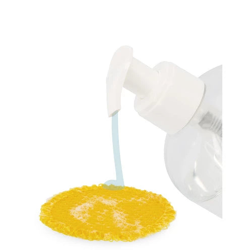 Blue liquid soap dispensed onto textured yellow absorbent disc