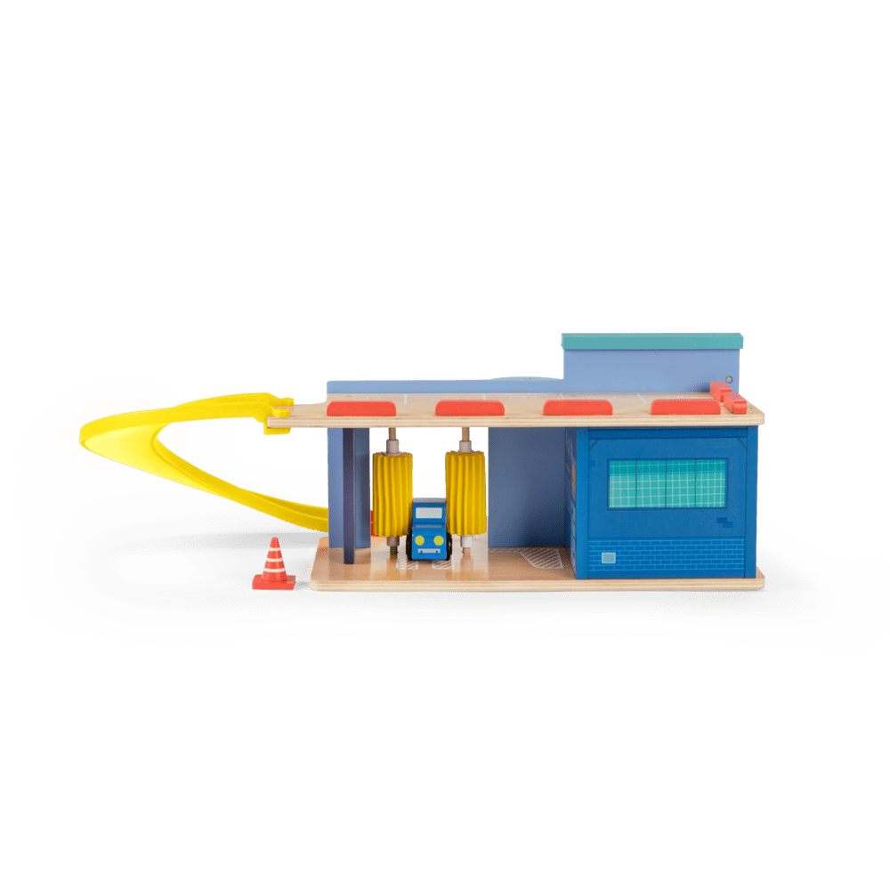 Rear view of wooden toy station with car wash brushes and curved yellow ramp