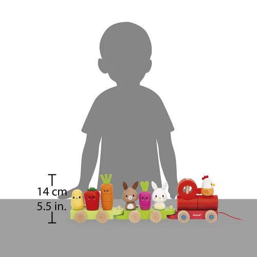 JANOD wooden farm train scale reference showing red locomotive and green wagons with figures