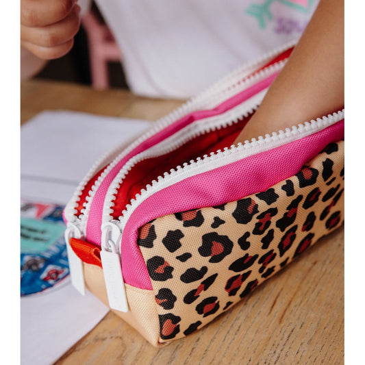 Close-up of Hello Hossy pencil case showing red lining and white zipper pull tabs