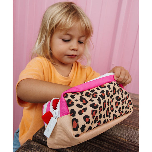 Child using open Hello Hossy leopard pencil case showing dual pink lined compartments