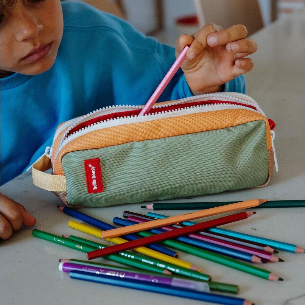Open Hello Hossy pencil case with orange green panels holding colorful pencils