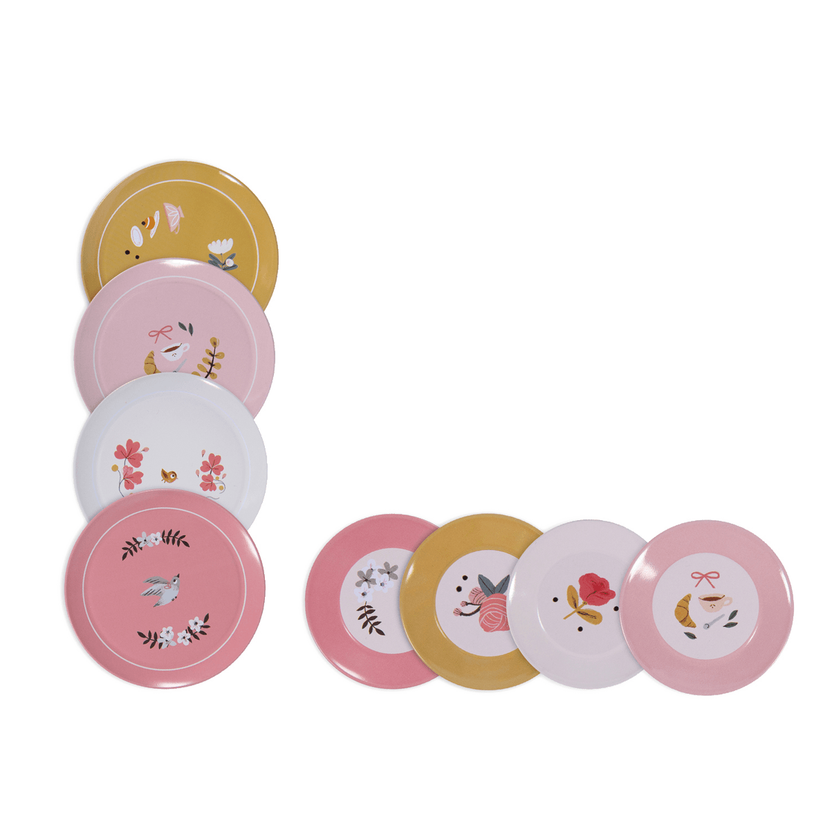 Flat lay of eight colorful metal dessert plates with botanical and pastry designs