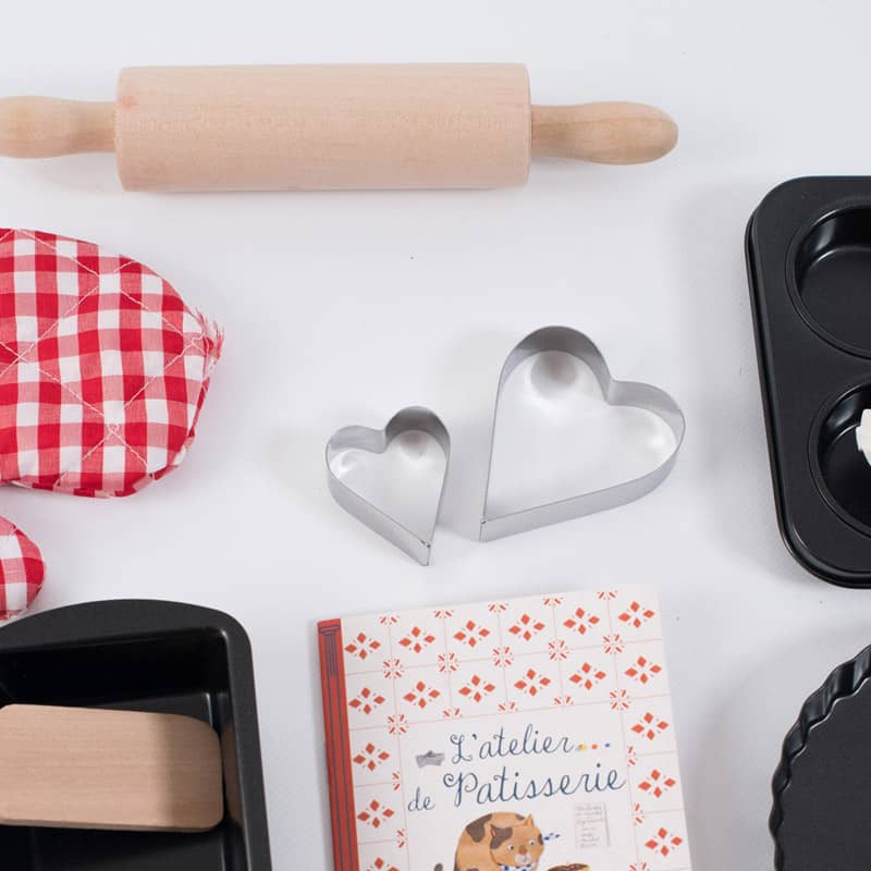 Wooden rolling pin and heart cookie cutters from pastry set