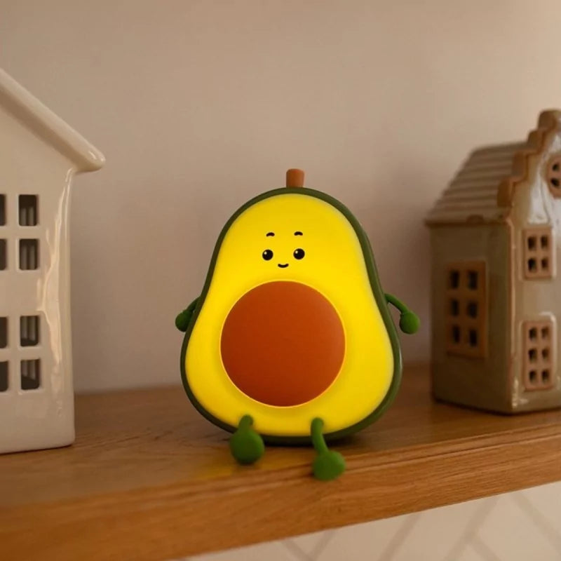 Illuminated avocado night light on shelf