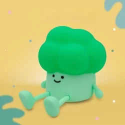 Matte silicone broccoli night light on yellow background