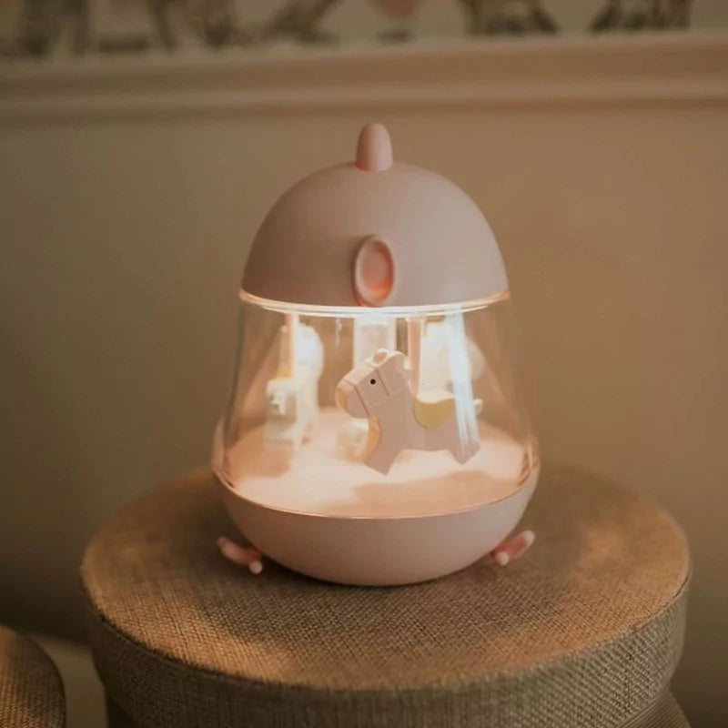 Illuminated pink egg-shaped night light casting warm glow on stool