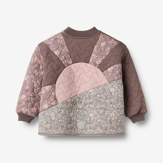 Nanna kids thermal jacket back view with reflective badge and patchwork design