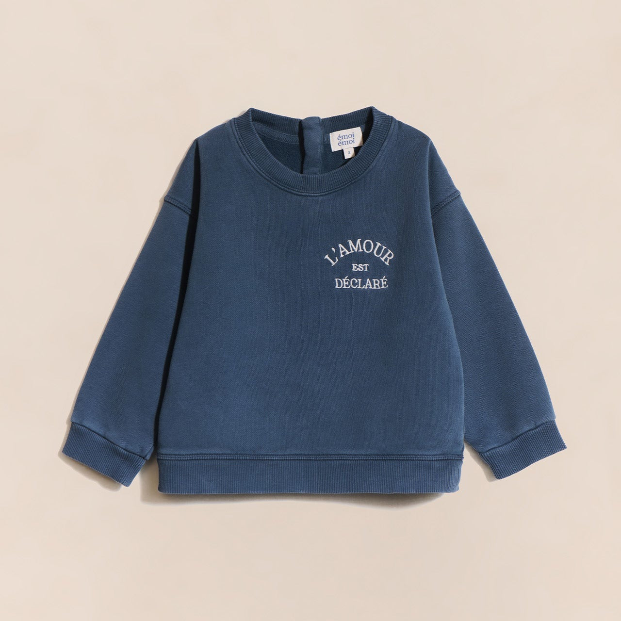 Le sweat L'amour est déclaré enfant - garment dye bleu