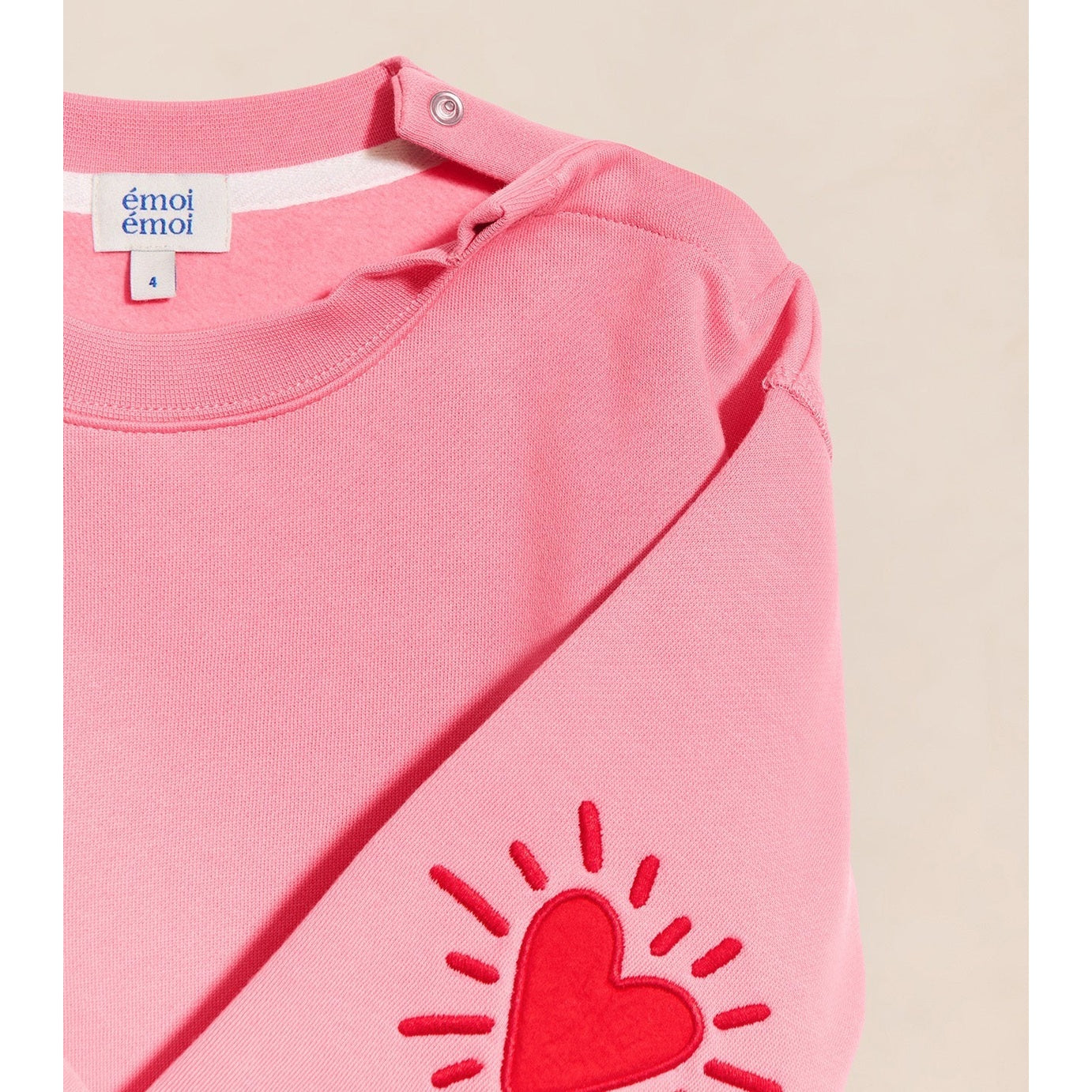 Le sweat Coeur solaire enfant avec coudières en coton bio - rose